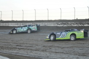 Owens wins first heat